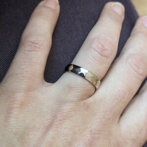 Sterling silver faceted wedding band